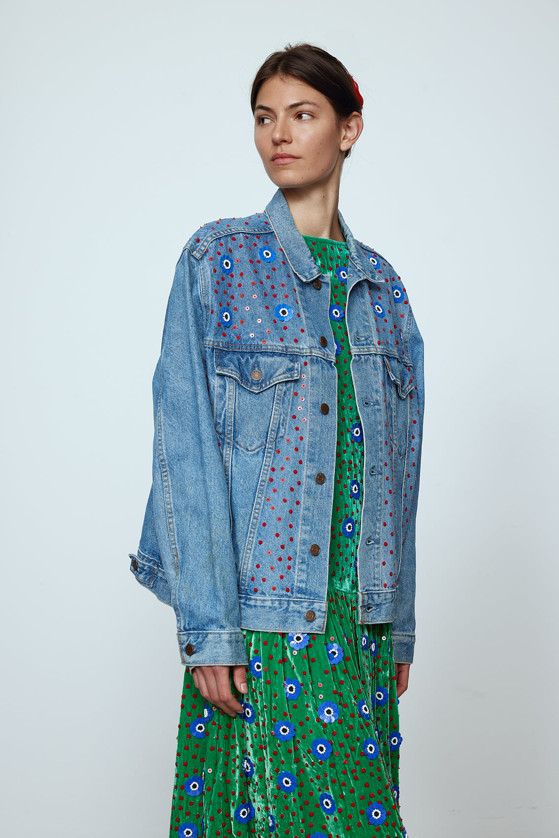 Upcycled Denim Jacket exquisitely hand-embroidered by skilled artisans in our flower daisy pattern using beadings and sequins.