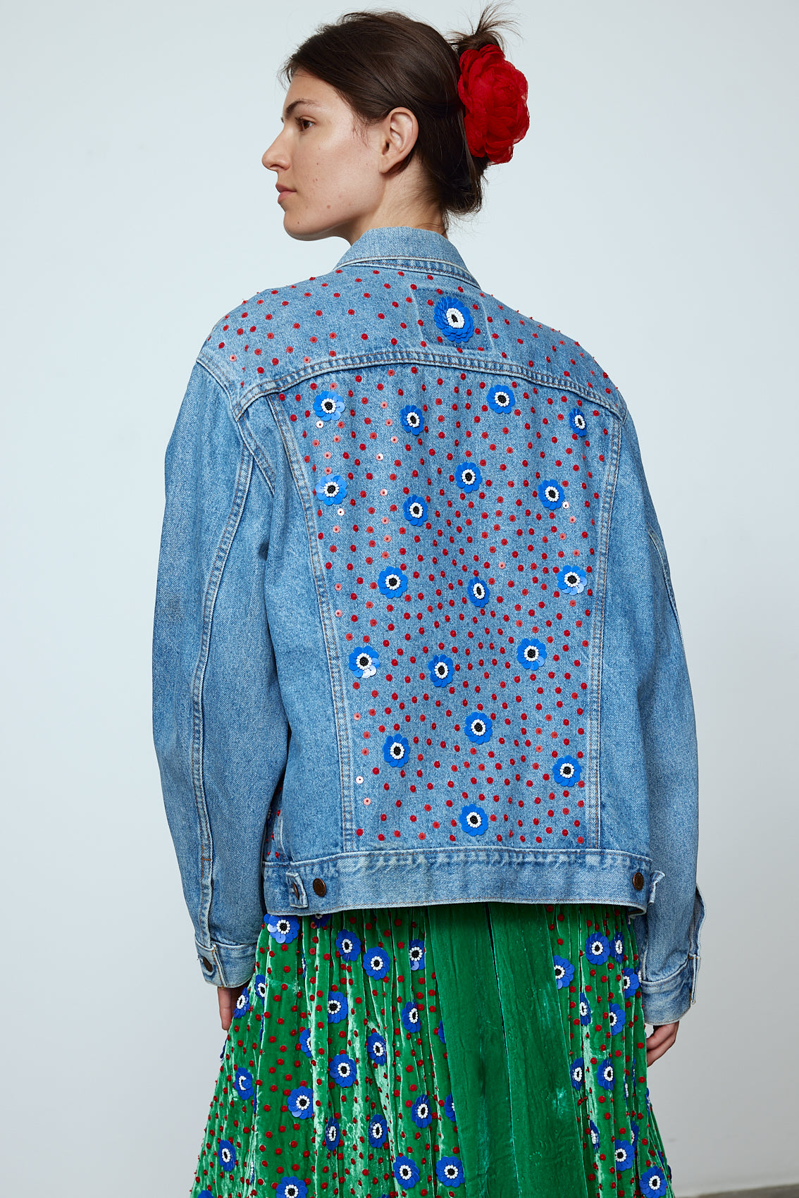 Upcycled Denim Jacket exquisitely hand-embroidered by skilled artisans in our flower daisy pattern using beadings and sequins.