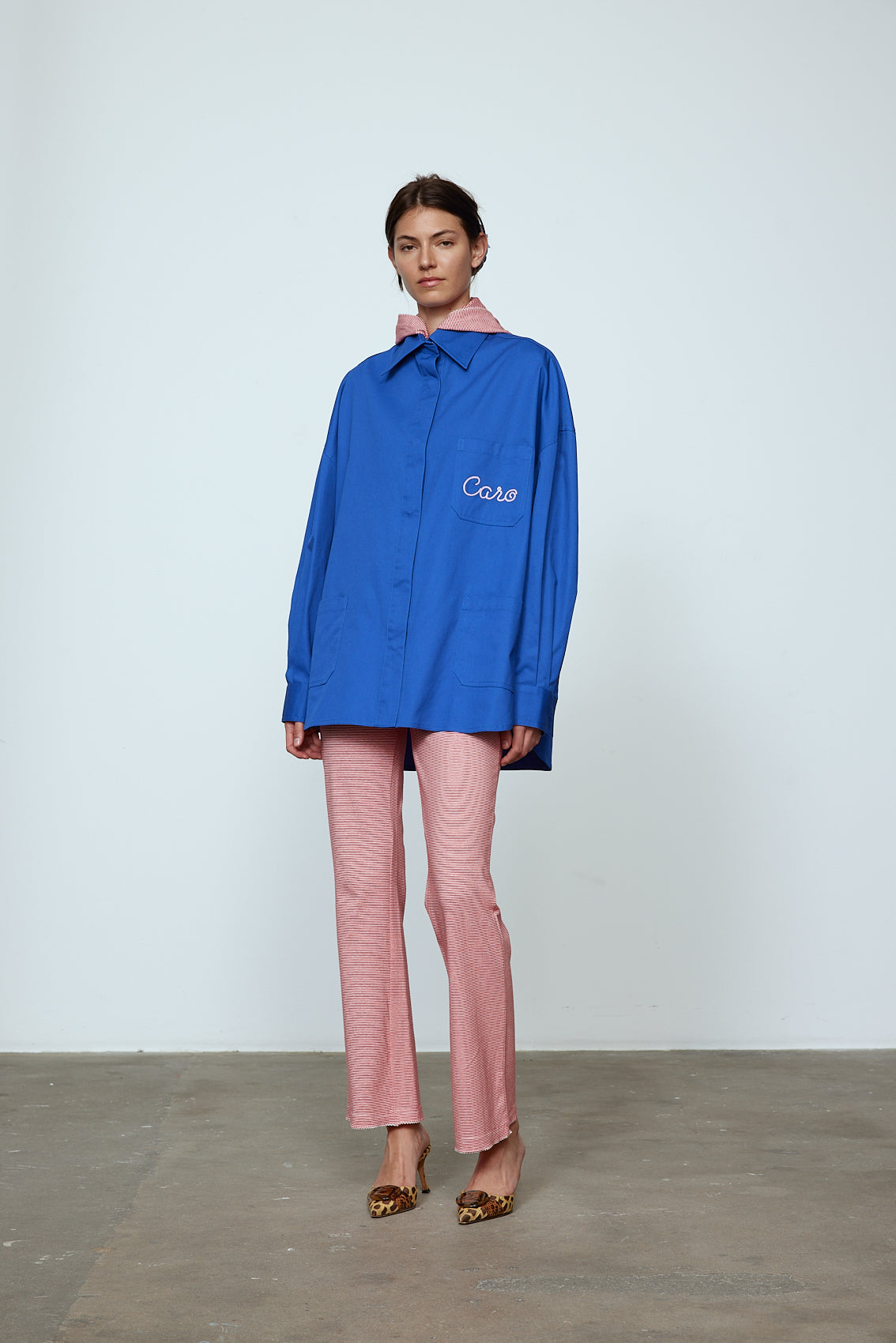 The Frederik Shirt is an oversized cotton style with big sleeves and an embroidered Caro logo on the front. Style it open over a dress, tank top, or t-shirt or buttoned up on its own. Material: 100% cotton. The model is 179cm (5'10") and wears size S. Inspired by Frederik Bille Brahe.