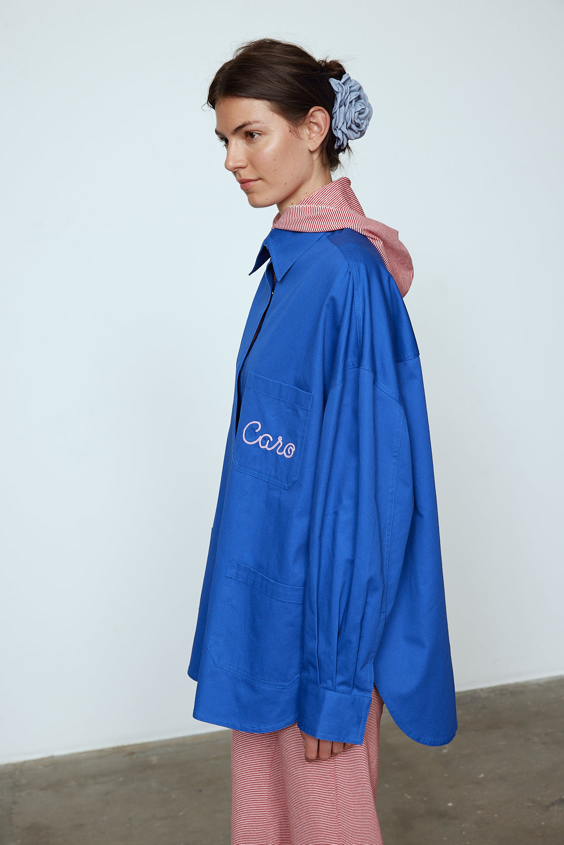The Frederik Shirt is an oversized cotton style with big sleeves and an embroidered Caro logo on the front. Style it open over a dress, tank top, or t-shirt or buttoned up on its own. Material: 100% cotton. The model is 179cm (5'10") and wears size S. Inspired by Frederik Bille Brahe.