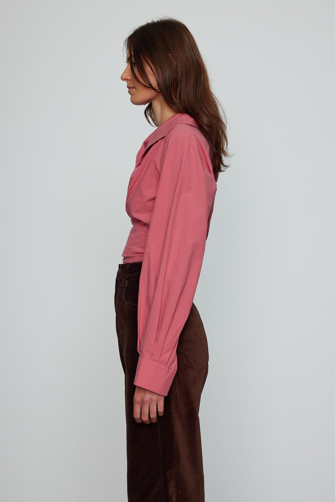 Caro Editions Nikita Blouse. This shirt features a fitted waist and signature Caro Editions sleeves with cuffs, inspired by the party vibe of the 70s. Style it on its own or with a top underneath. Material: 100% Cotton