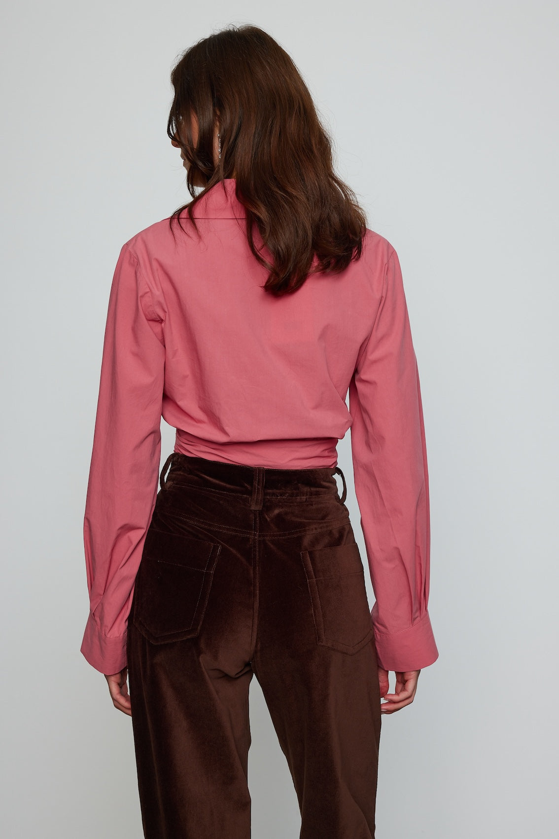 Caro Editions Nikita Blouse. This shirt features a fitted waist and signature Caro Editions sleeves with cuffs, inspired by the party vibe of the 70s. Style it on its own or with a top underneath. Material: 100% Cotton
