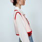 The Ravnbak Vest in Baby Pink with a red lining. Style it over a shirt, dress or top.  Also available in Beaded Olive Green.  Material: 70% viscose, 30% tencel. Lining: 100% viscose.