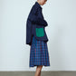 The Frederik Shirt is an oversized cotton style with big sleeves, green pockets, and an embroidered Caro logo on the front.  Style it open over a dress, tank top, or t-shirt or buttoned up on its own.  Material: 100% cotton.  The model is 179cm (5'10") and wears size S.