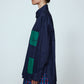 The Frederik Shirt is an oversized cotton style with big sleeves, green pockets, and an embroidered Caro logo on the front.  Style it open over a dress, tank top, or t-shirt or buttoned up on its own.  Material: 100% cotton.  The model is 179cm (5'10") and wears size S.