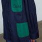 The Frederik Shirt is an oversized cotton style with big sleeves, green pockets, and an embroidered Caro logo on the front.  Style it open over a dress, tank top, or t-shirt or buttoned up on its own.  Material: 100% cotton.  The model is 179cm (5'10") and wears size S.
