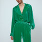 The Bonsai Shirt is made in a luxurious silk velvet fabric with a heavy fall and a deep emerald green color. The Shirt features long draped sleeves, a deep-cut oversized shirt collar, and buttons on the front.   Style it with jeans and a colorful belt, or match it with the Elisabeth Pants in emerald green Silk Velvet for parties, dinners, and special occasions.    Material: 20% silk, 80% viscose.  The model is 179cm (5'10") and wears size S.