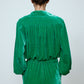 The Bonsai Shirt is made in a luxurious silk velvet fabric with a heavy fall and a deep emerald green color. The Shirt features long draped sleeves, a deep-cut oversized shirt collar, and buttons on the front.   Style it with jeans and a colorful belt, or match it with the Elisabeth Pants in emerald green Silk Velvet for parties, dinners, and special occasions.    Material: 20% silk, 80% viscose.  The model is 179cm (5'10") and wears size S.