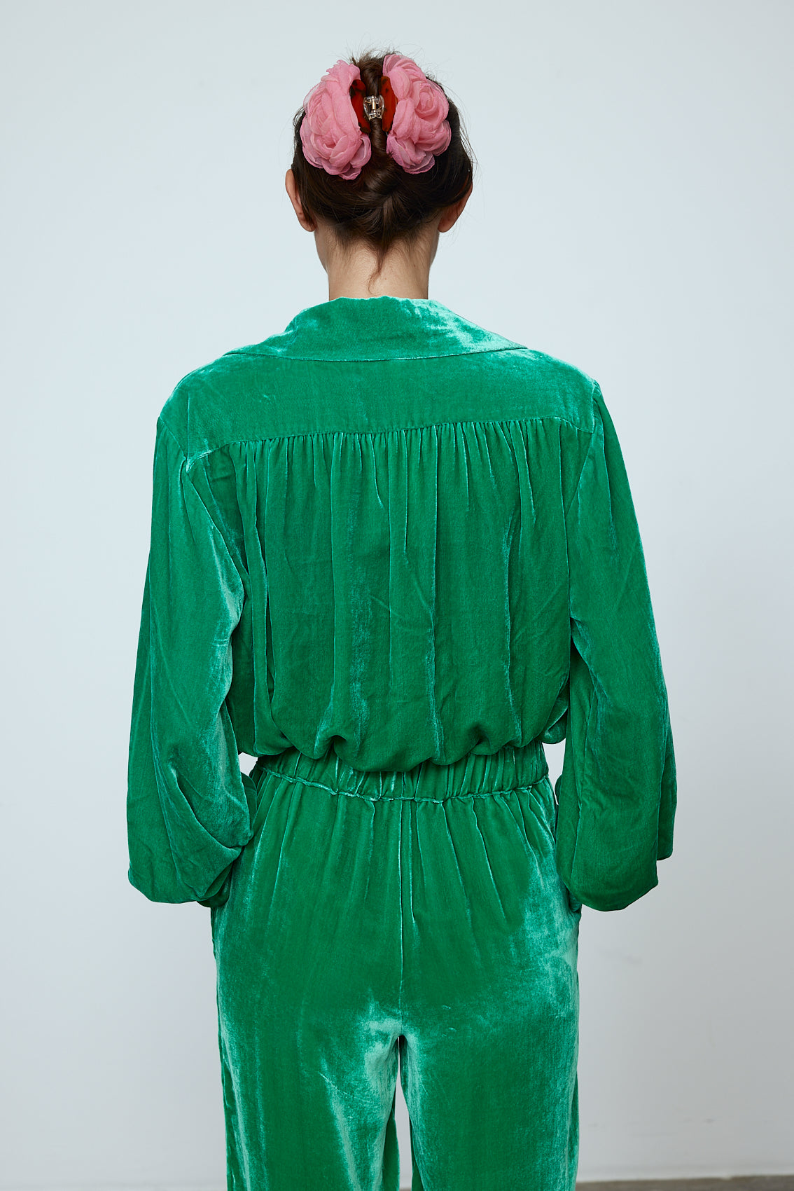 The Bonsai Shirt is made in a luxurious silk velvet fabric with a heavy fall and a deep emerald green color. The Shirt features long draped sleeves, a deep-cut oversized shirt collar, and buttons on the front.   Style it with jeans and a colorful belt, or match it with the Elisabeth Pants in emerald green Silk Velvet for parties, dinners, and special occasions.    Material: 20% silk, 80% viscose.  The model is 179cm (5'10") and wears size S.