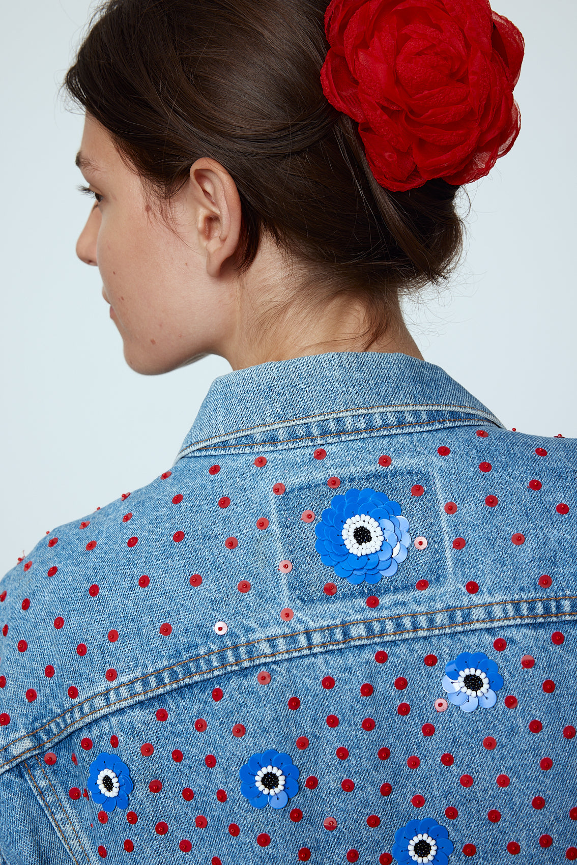 Upcycled Denim Jacket exquisitely hand-embroidered by skilled artisans in our flower daisy pattern using beadings and sequins.