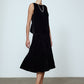 The Sonya Dress is an oversized style with a high neckline and deep back with large bow detail. The dress is made of luxuriously heavy black silk velvet.   Style it with a belt or on its own.  Material: 20% silk, 80% viscose.  The model is 179cm (5'10") and wears size S.