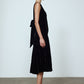 The Sonya Dress is an oversized style with a high neckline and deep back with large bow detail. The dress is made of luxuriously heavy black silk velvet.   Style it with a belt or on its own.  Material: 20% silk, 80% viscose.  The model is 179cm (5'10") and wears size S.