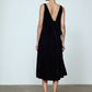The Sonya Dress is an oversized style with a high neckline and deep back with large bow detail. The dress is made of luxuriously heavy black silk velvet.   Style it with a belt or on its own.  Material: 20% silk, 80% viscose.  The model is 179cm (5'10") and wears size S.