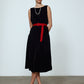 The Sonya Dress is an oversized style with a high neckline and deep back with large bow detail. The dress is made of luxuriously heavy black silk velvet.   Style it with a belt or on its own.  Material: 20% silk, 80% viscose.  The model is 179cm (5'10") and wears size S.