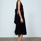 The Sonya Dress is an oversized style with a high neckline and deep back with large bow detail. The dress is made of luxuriously heavy black silk velvet.   Style it with a belt or on its own.  Material: 20% silk, 80% viscose.  The model is 179cm (5'10") and wears size S.