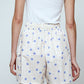 The Hannah shorts are loose-fitted poplin-style shorts with an elastic band.  Style it with a matching Hannah shirt or a t-shirt.  Material: 100% cotton.  The model is 179cm (5'10") and wears size S.
