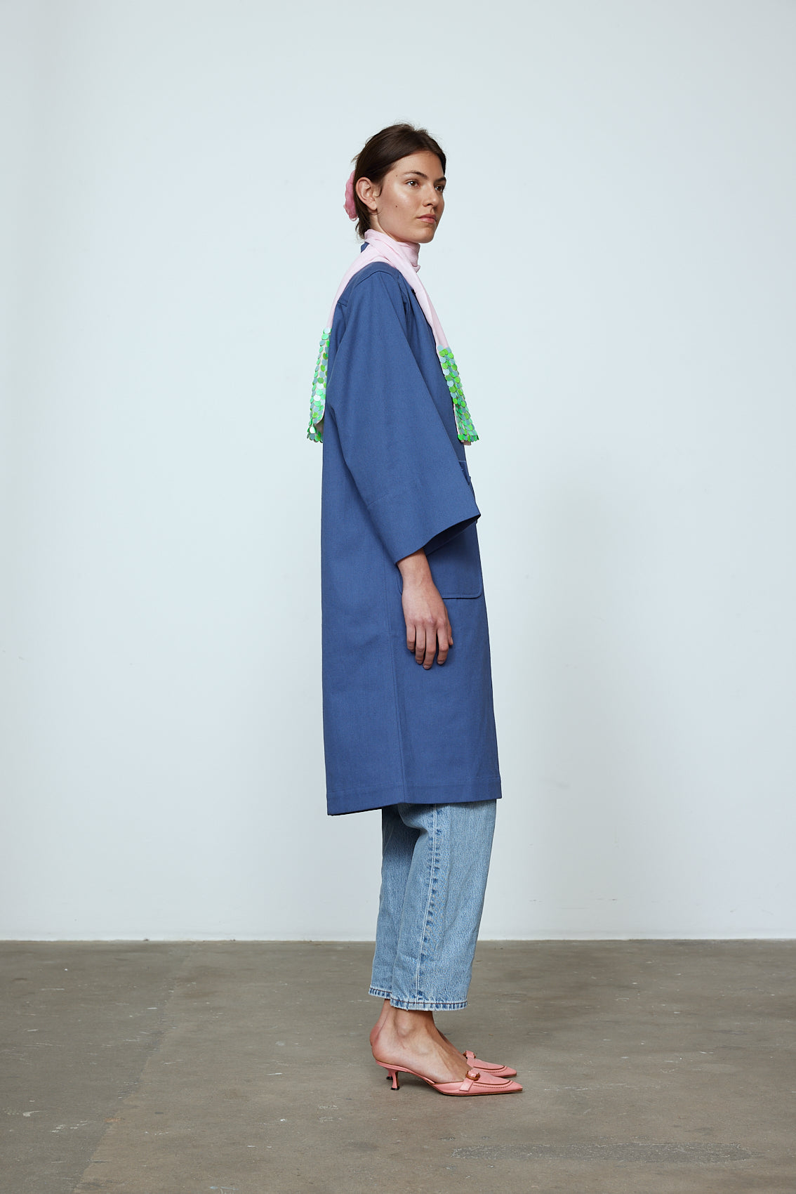 The Anna Coat in French Blue Canvas. The jacket is inspired by vintage work-wear with wide sleeves, cuffs, and button closing on the front.  Material: 100% cotton.