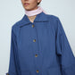 The Anna Coat in French Blue Canvas. The jacket is inspired by vintage work-wear with wide sleeves, cuffs, and button closing on the front.  Material: 100% cotton.