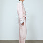 The Emma Jacket in Baby Pink Linen. A new flattering jacket shape inspired by Caroline's favorite vintage 70's finds. The Jacket features a single-button closing, balloon sleeves, and contrasting color piping details around the edges.   Also available in Navy and Orange/Pink.