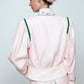 The Emma Jacket in Baby Pink Linen. A new flattering jacket shape inspired by Caroline's favorite vintage 70's finds. The Jacket features a single-button closing, balloon sleeves, and contrasting color piping details around the edges.   Also available in Navy and Orange/Pink.