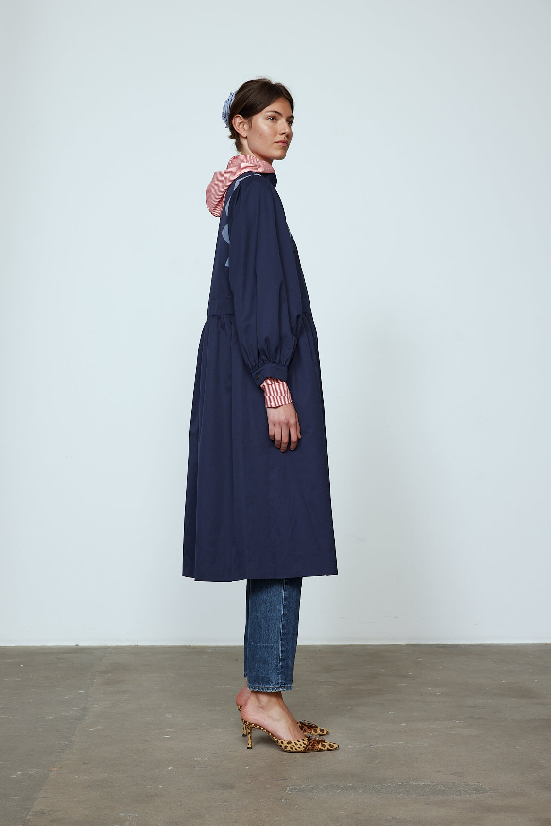 Agnes Coat in Navy Canvas with Dove Blue corduroy triangular details. The Jacket features a hidden push-button closing and balloon sleeves.  Material: Shell: 100% cotton. Lining: 100% viscose.