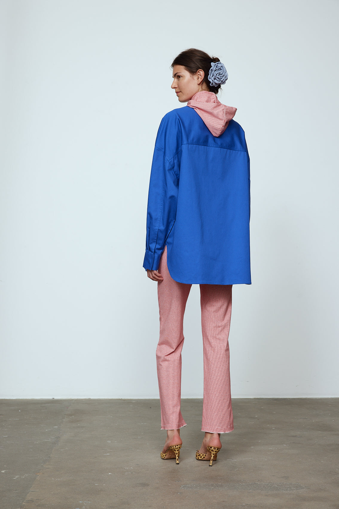 The Frederik Shirt is an oversized cotton style with big sleeves and an embroidered Caro logo on the front.  Style it open over a dress, tank top, or t-shirt or buttoned up on its own.  Material: 100% cotton.  The model is 179cm (5'10") and wears size S. Inspired by Frederik Bille Brahe.
