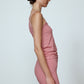 Caro Editions' new signature line in jersey cotton.  The Caro Tank is a fitted style with a ribbon bow detail at the front and embroidered Caro Editions logo on the back.   Also available in White, Pink White stripe, and Black White stripe.  Style the Caro Tank under shirts or dresses, or wear them on their own.  Material: 95% cotton, 5% elastane. Bow: 100% Polyester.  The model is 179cm (5'10") and wears size S.