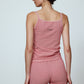 Caro Editions' new signature line in jersey cotton.  The Caro Tank is a fitted style with a ribbon bow detail at the front and embroidered Caro Editions logo on the back.   Also available in White, Pink White stripe, and Black White stripe.  Style the Caro Tank under shirts or dresses, or wear them on their own.  Material: 95% cotton, 5% elastane. Bow: 100% Polyester.  The model is 179cm (5'10") and wears size S.
