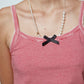 Caro Editions' new signature line in jersey cotton.  The Caro Tank is a fitted style with a ribbon bow detail at the front and embroidered Caro Editions logo on the back.   Also available in White, Pink White stripe, and Black White stripe.  Style the Caro Tank under shirts or dresses, or wear them on their own.  Material: 95% cotton, 5% elastane. Bow: 100% Polyester.  The model is 179cm (5'10") and wears size S.