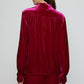 Caro Editions Bonsai Shirt is made in a luxurious silk velvet fabric with a heavy fall. The Shirt features long draped sleeves, a deep-cut oversized shirt collar, and buttons on the front.   Style it with jeans and a colorful belt, or match it with matching Bonsai Pants in Silk Velvet for parties, dinners, and special occasions. Material: 80% Viscose, 20% Silk.