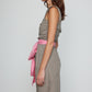 Caro Editions Sophie Dress is a classic dress with a big detachable bow detail on the side. The Dress features wide straps, a slit, and a fitted waist. The dress is made in lightweight cotton poplin. Both the bow and the belt in pink can is detachable.