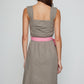 Caro Editions Sophie Dress is a classic dress with a big detachable bow detail on the side. The Dress features wide straps, a slit, and a fitted waist. The dress is made in lightweight cotton poplin. Both the bow and the belt in pink can is detachable.