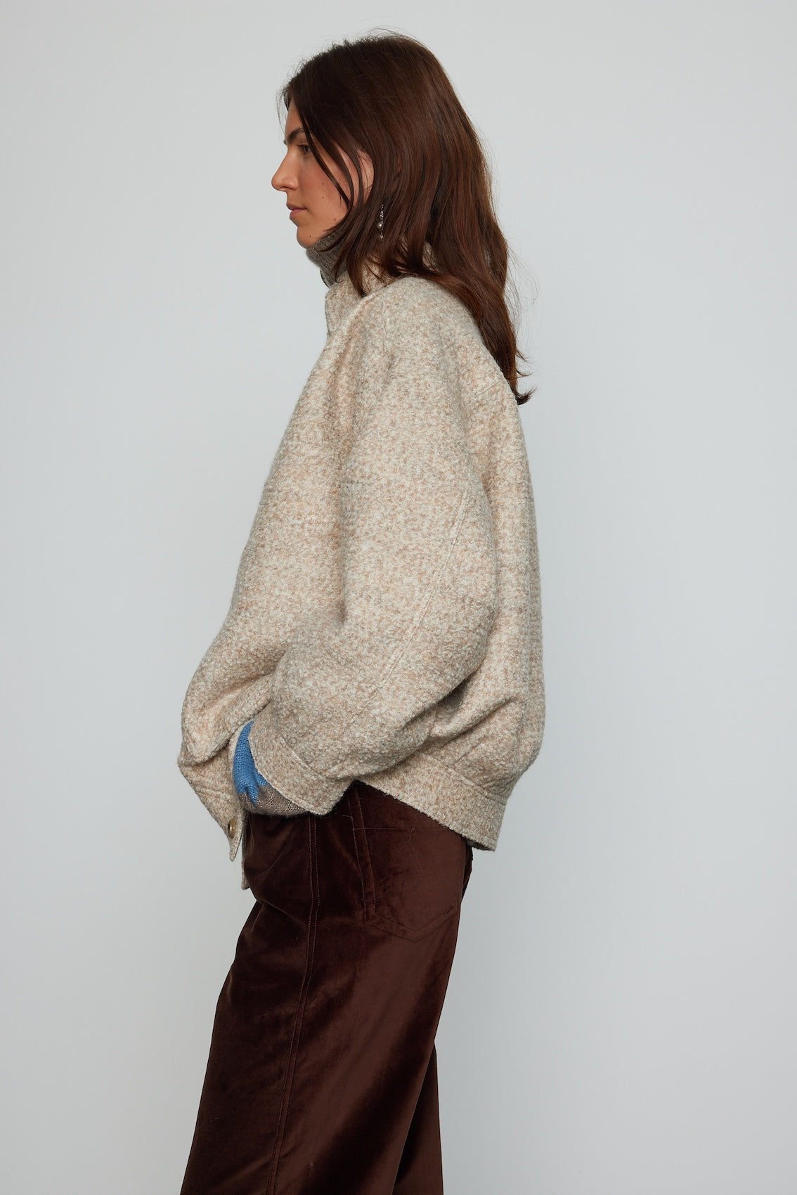 Caro Editions Mimi Jacket in wool boucle. A rounded shape inspired by the 80s with big round buttons.