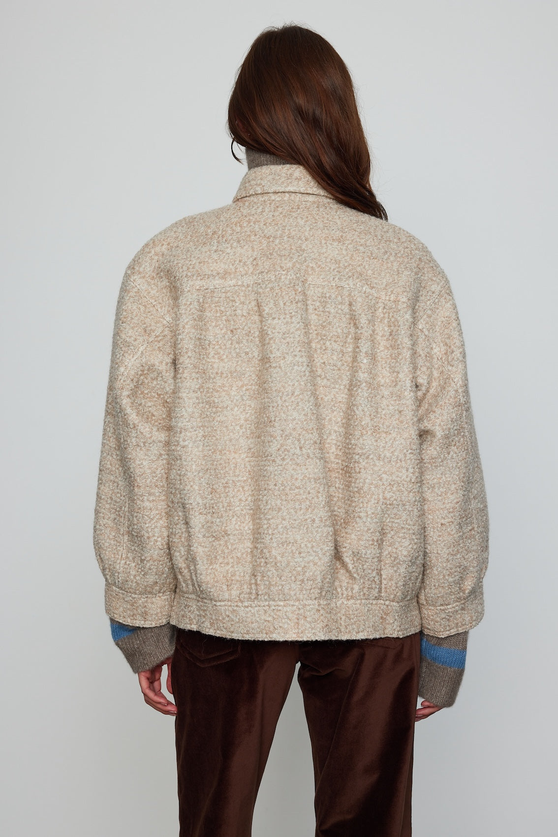 Caro Editions Mimi Jacket in wool boucle. A rounded shape inspired by the 80s with big round buttons.