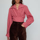 Caro Editions Nikita Blouse. This shirt features a fitted waist and signature Caro Editions sleeves with cuffs, inspired by the party vibe of the 70s.  Style it on its own or with a top underneath.  Material: 100% Cotton