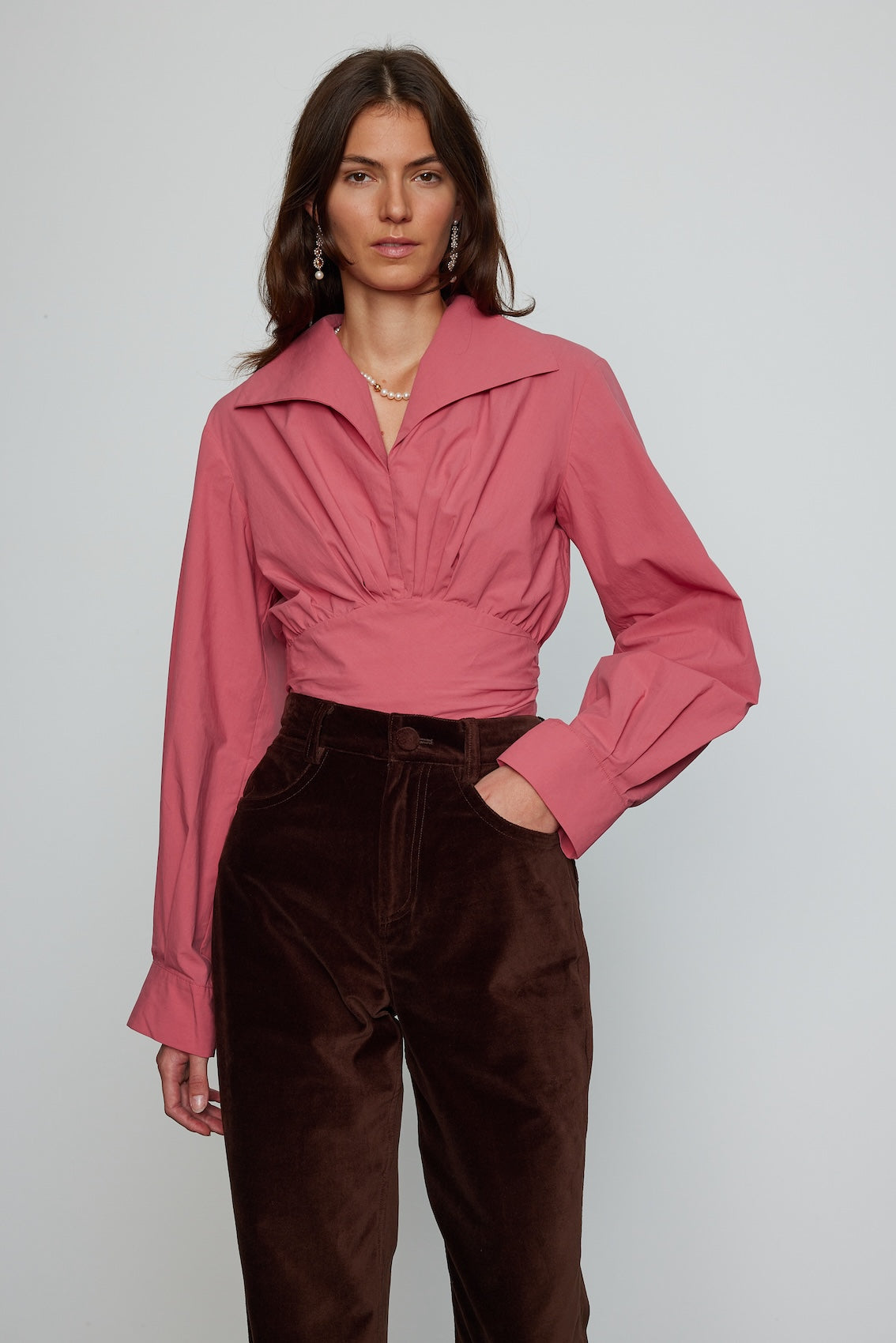 Caro Editions Nikita Blouse. This shirt features a fitted waist and signature Caro Editions sleeves with cuffs, inspired by the party vibe of the 70s.  Style it on its own or with a top underneath.  Material: 100% Cotton