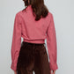 Caro Editions Nikita Blouse. This shirt features a fitted waist and signature Caro Editions sleeves with cuffs, inspired by the party vibe of the 70s. Style it on its own or with a top underneath. Material: 100% Cotton
