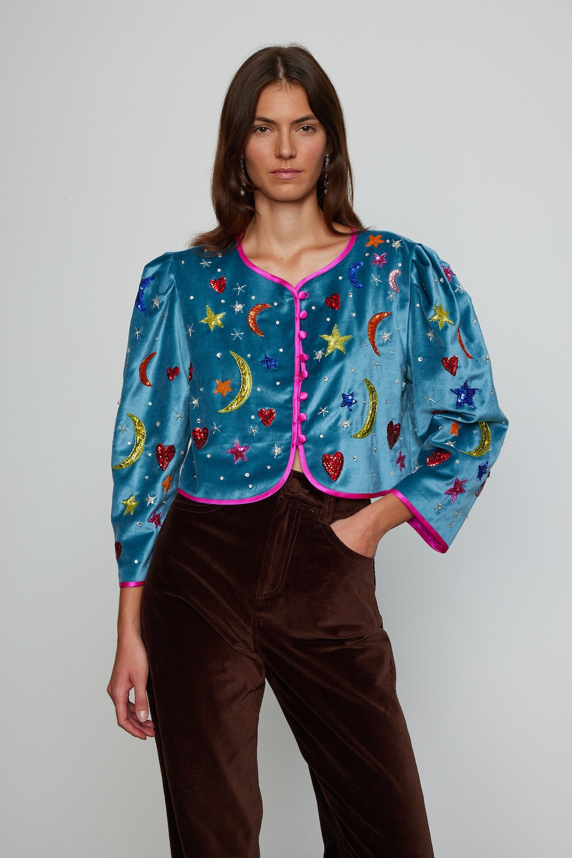 Caro Editions Blanca Jackets is one-of-kind, exquisitely hand-embroidered by skilled artisans using beads and sequins. This vibrant jacket is made in soft cotton velvet with silk lining and petit silk-covered buttons.  Material: 100% cotton. Lining: 100% silk satin. Beading: polyester & glass.