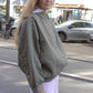 The Mimi Jacket in Khaki padded twill. A rounded shape inspired by the 80s in quilted fabric with big round buttons.  Style it over dresses, jeans, or leggings. 