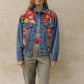 Upcycled vintage denim jacket redesigned with patchwork in exclusive Josef Frank vintage fabric with a green floral print. One-of-a-kind.  Size: S/M