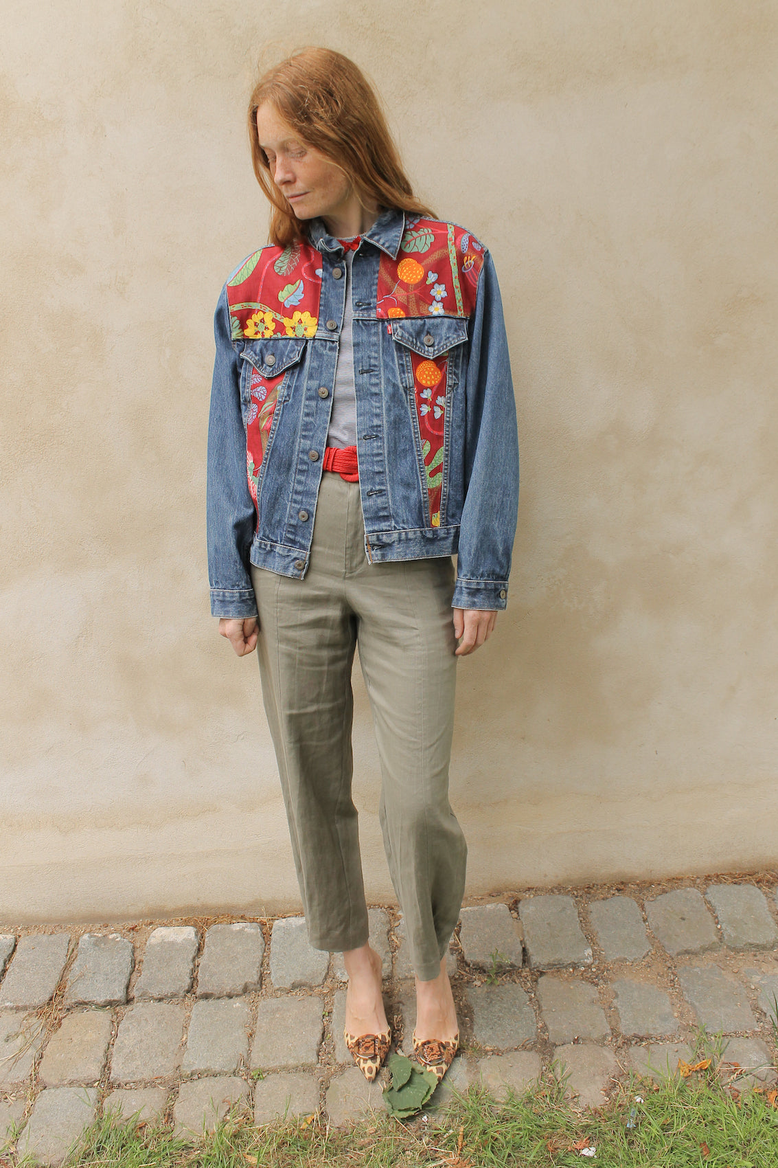 Upcycled vintage denim jacket redesigned with patchwork in exclusive Josef Frank vintage fabric with a green floral print. One-of-a-kind.  Size: S/M