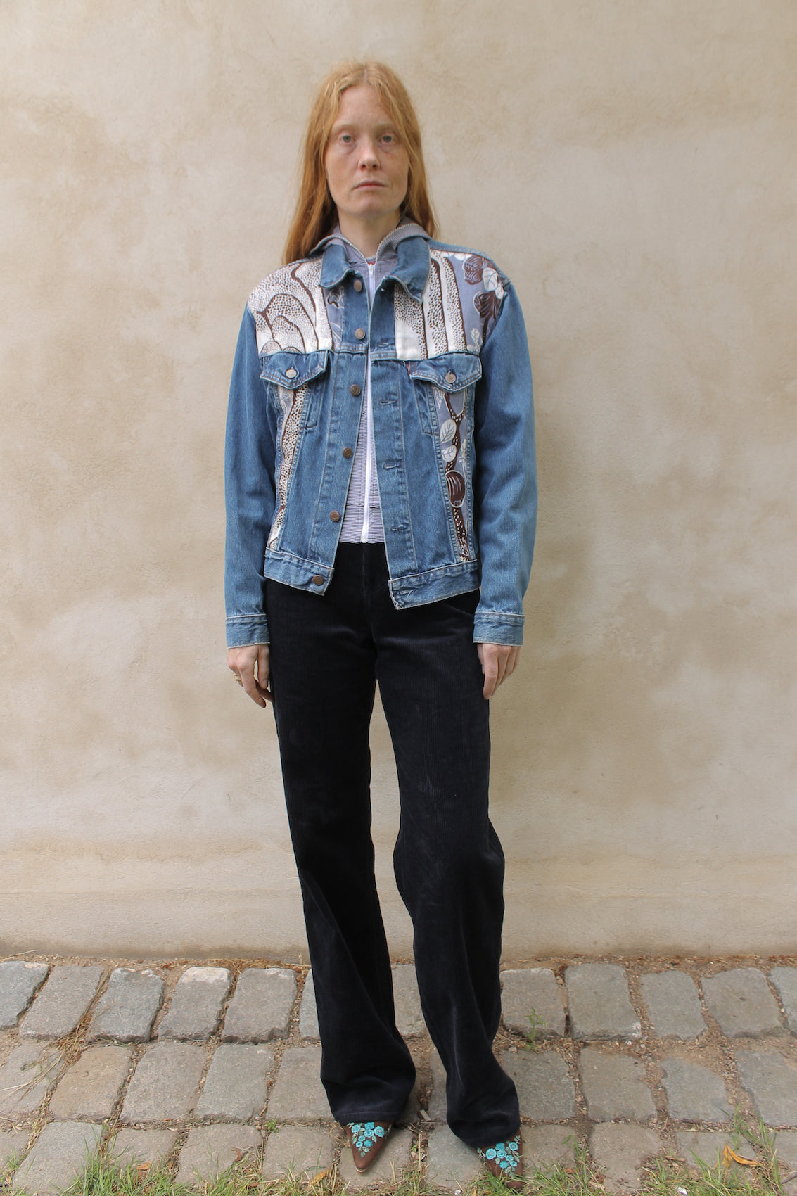 Upcycled vintage denim jacket redesigned with patchwork in exclusive Josef Frank vintage fabric with a green floral print. One-of-a-kind.  Size: S/M