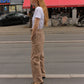 The Hannah Pants are loose-fitted cotton poplin pants. The pants feature back pockets and cargo details on the side.  Style them with the matching Hannah Pants or a classic t-shirt.  Also available in Bottle Green, Navy, Pink, Navy Flower and White Flower.  Material: 100% cotton.  The model is 175cm (5'9") and is wearing a size S.