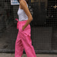 The Hannah Pants are loose-fitted cotton poplin pants. The pants feature back pockets and cargo details on the side.  Style them with the matching Hannah Pants or a classic t-shirt.  Also available in Bottle Green, Navy, Kahki, Navy Flower and White Flower.  Material: 100% cotton.  The model is 175cm (5'9") and is wearing a size S.