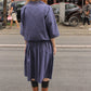 The Amanda Dress in Navy Crisp Cotton Poplin with an elastic waistband.   Material: 100% cotton.  The model is 179cm (5'10") and is wearing a size S.