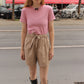 The Hannah shorts are loose-fitted poplin-style shorts with an elastic band, pockets, and cargo details.  Style it with a matching Hannah Shirt or a T-shirt.  Also available in Navy Flower Poplin, White Flower Poplin, and Pink.  Material: 100% cotton.  The model is 175cm (5'9") and is wearing a size S.