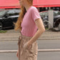 The Hannah shorts are loose-fitted poplin-style shorts with an elastic band, pockets, and cargo details.  Style it with a matching Hannah Shirt or a T-shirt.  Also available in Navy Flower Poplin, White Flower Poplin, and Pink.  Material: 100% cotton.  The model is 175cm (5'9") and is wearing a size S.